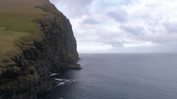 Drone Footage of Rocky Faroe Islands Shoreline Cliff