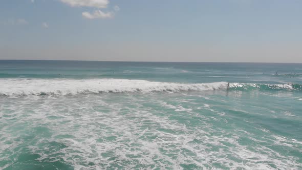 Aerial View of Surfer on the Wave Indonesia Ocean