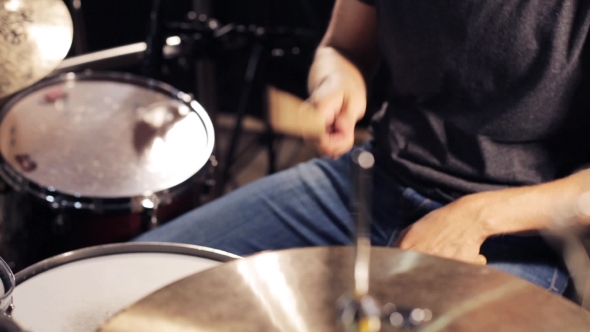 Male Musician Playing Drums And Cymbals At Studio 12 alt