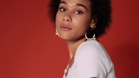 A happy woman dancing alt