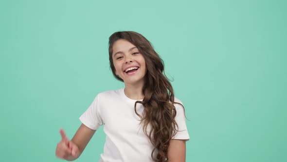 Moving Child with Happy Face Dancing and Directing Fingers Different Sides Point Finger on Camera