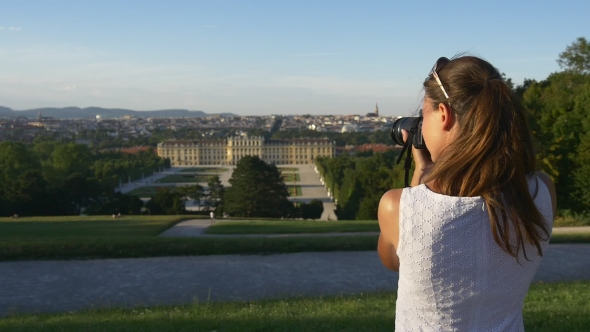Woman Photographing European Historical Buildings