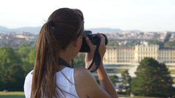 Woman Photographing Austrian Cityscape