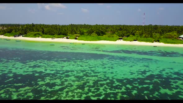 Aerial sky of exotic coast beach trip by transparent ocean with white sandy background of a picnic n alt