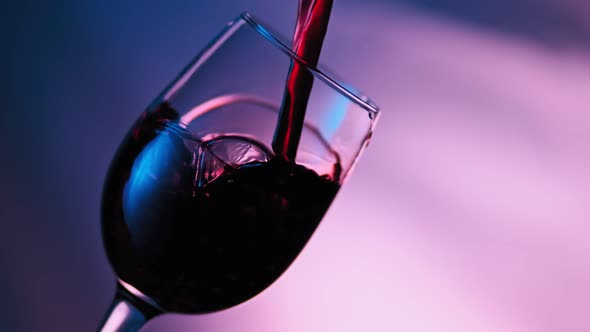 Red Wine Pouring From Bottle alt