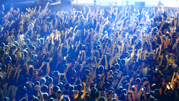 Joyful Crowd Enjoys Listening Famous Group Rock Concert, Stock Footage