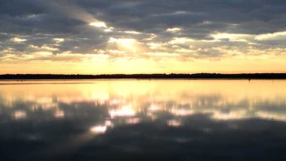 Beautiful Colorful Clouds Over Water