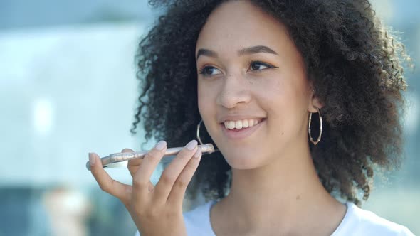 American Woman Young Student Doing Online Order From Application Audio Recorder on Smartphone alt