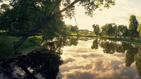 Flying Over Lake on Sunset