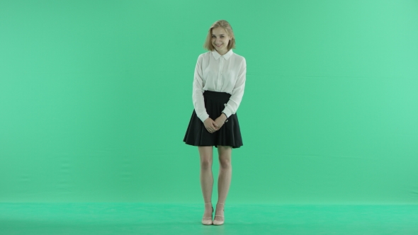 Shy Young Woman on Green Screen alt