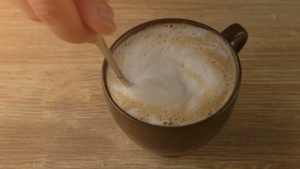  Of Hand Mixing Cappuccino Coffee Foam With Spoon
