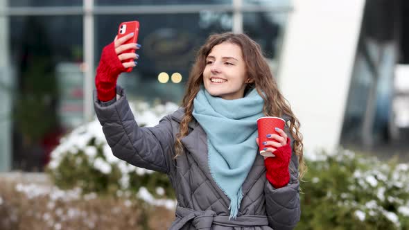 Cheerful Woman Recording Video for Vlog in Social Media or Making a Video Call 
