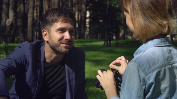 Pair Eat Fruit Outing. alt