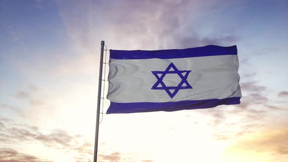 The National Flag of Israel Waving in the Wind Dramatic Sky Background alt