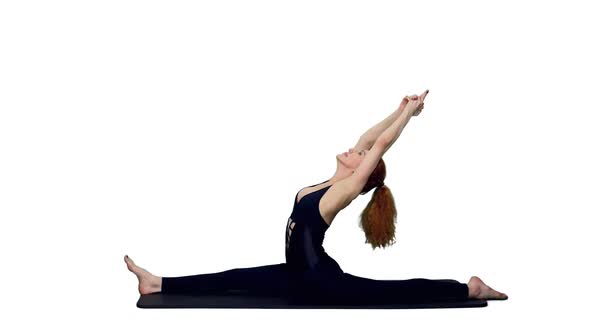 Sporty Woman In Black Bodysuit Doing Splits During Yoga Practice, Alpha Channel