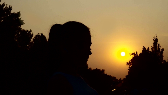 Silhouette Of Woman Drinking Water