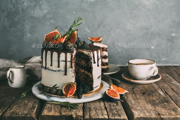 Delicious chocolate cake with figs and blackberries