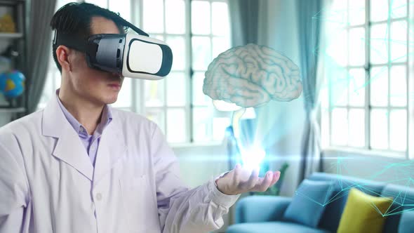 Doctor Using Vr Glasses Virtual Reality Holding Digital X-Ray Of Human Brain alt