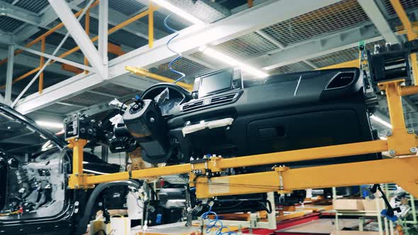 Car Interior Assembling Process at a Car Factory alt