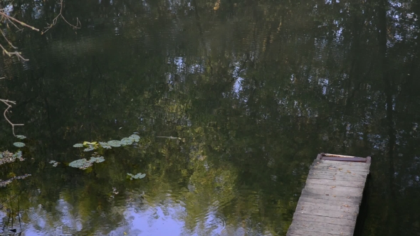 Wooden Small Platform On River.