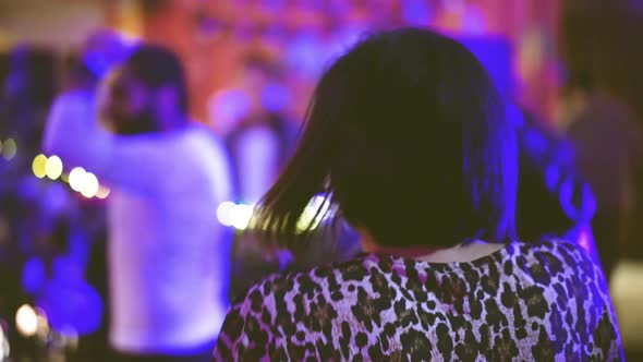 Lovely Brunette Girl Dancing with Bearded Guy Near Disco DJ at Night Club Party alt