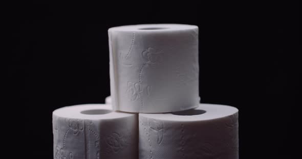 Toilet Paper Isolated on Black Background Rotating alt