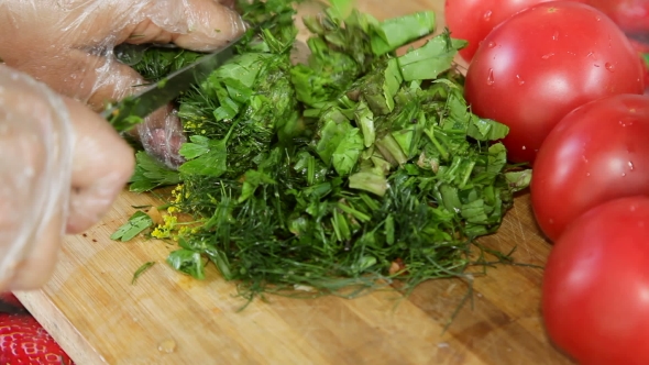 Dill And Parsley Being Chopped