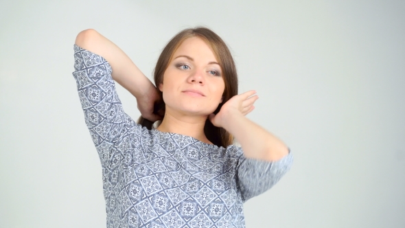 Pregnant Woman Braids The Hair And Pats Belly