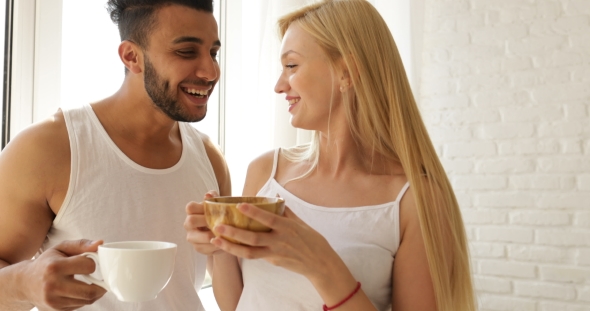Couple Drink Coffee Morning Near Window Mix Race Man Woman Smile