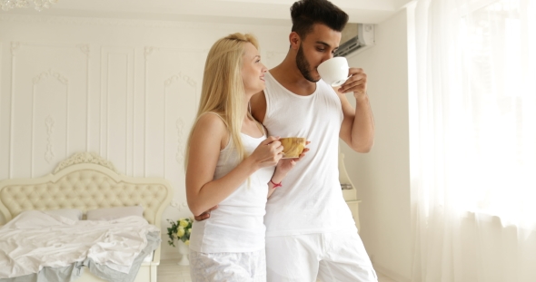 Couple Drink Coffee Morning Near Window Mix Race Man Woman Smile
