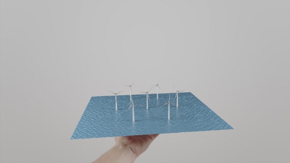 Man Twists In Hand Windmills Located On Water. Gray Background. Alternative Ecologic Power alt