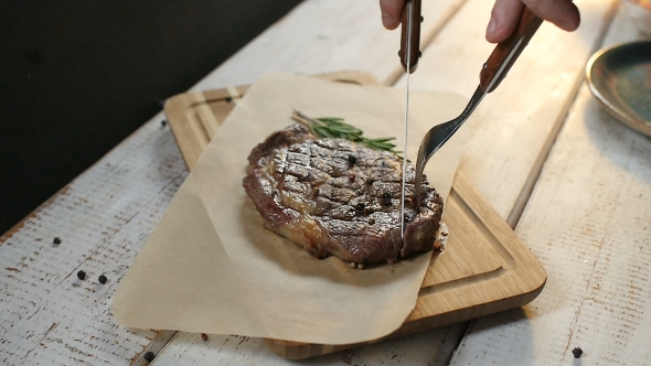 Man's Hand Cut Steak Meat Dish