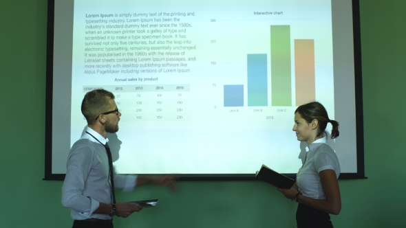 Meeting In a Conference Room With Projector And Chart alt