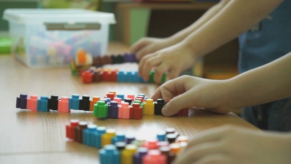 Children Play Intellectual Games At a Kindergarten