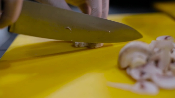 Chef Cuts Mushrooms Into Small Pieces