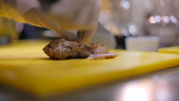 Chef Cuts The Roast Duck Breast