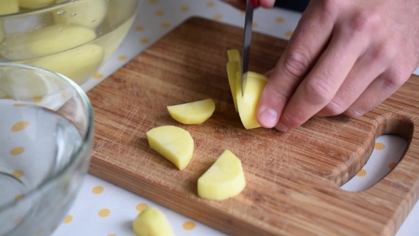 Cutting Potatoes Into Pieces