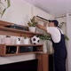 Male Handyman in Overalls Repairs or Cleans the Air Conditioner in the Apartment - VideoHive Item for Sale