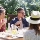 Happy Friends Having Dinner At Summer Garden Party - VideoHive Item for Sale