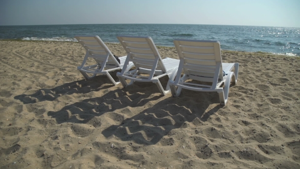 Deck Chair On Beach In Swanage, England alt