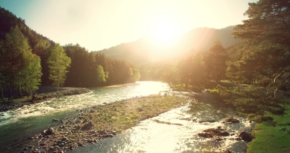 Low Flight Over Fresh Cold Mountain River at Sunny Summer Morning. alt