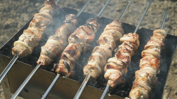 Kebabs Are Roasted On The Metal Skewers On Coals