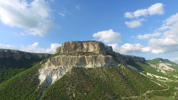 Small White Mountain With Trees