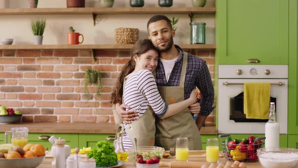 Very Lovely Couple Multiracial Posing in Front of alt