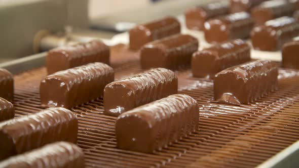 Chocolate Sweets on the Conveyor Belt alt