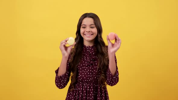 Happy Playful Girl Kid Have Cookie Fun Sticking Tongue Out Yellow Background Macaroons alt