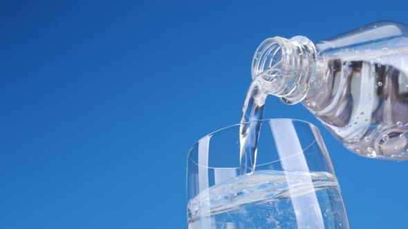 Water pouring in a glass