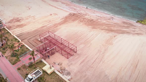 Renovating beach infrastructure before summer vacation season.  alt