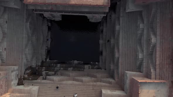 Bird's eye view of deep Toorji’s Step Well in the middle of Blue city Jodhpur, Rajasthan, India alt