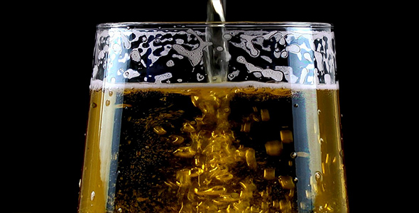 Pouring Beer on Black Background